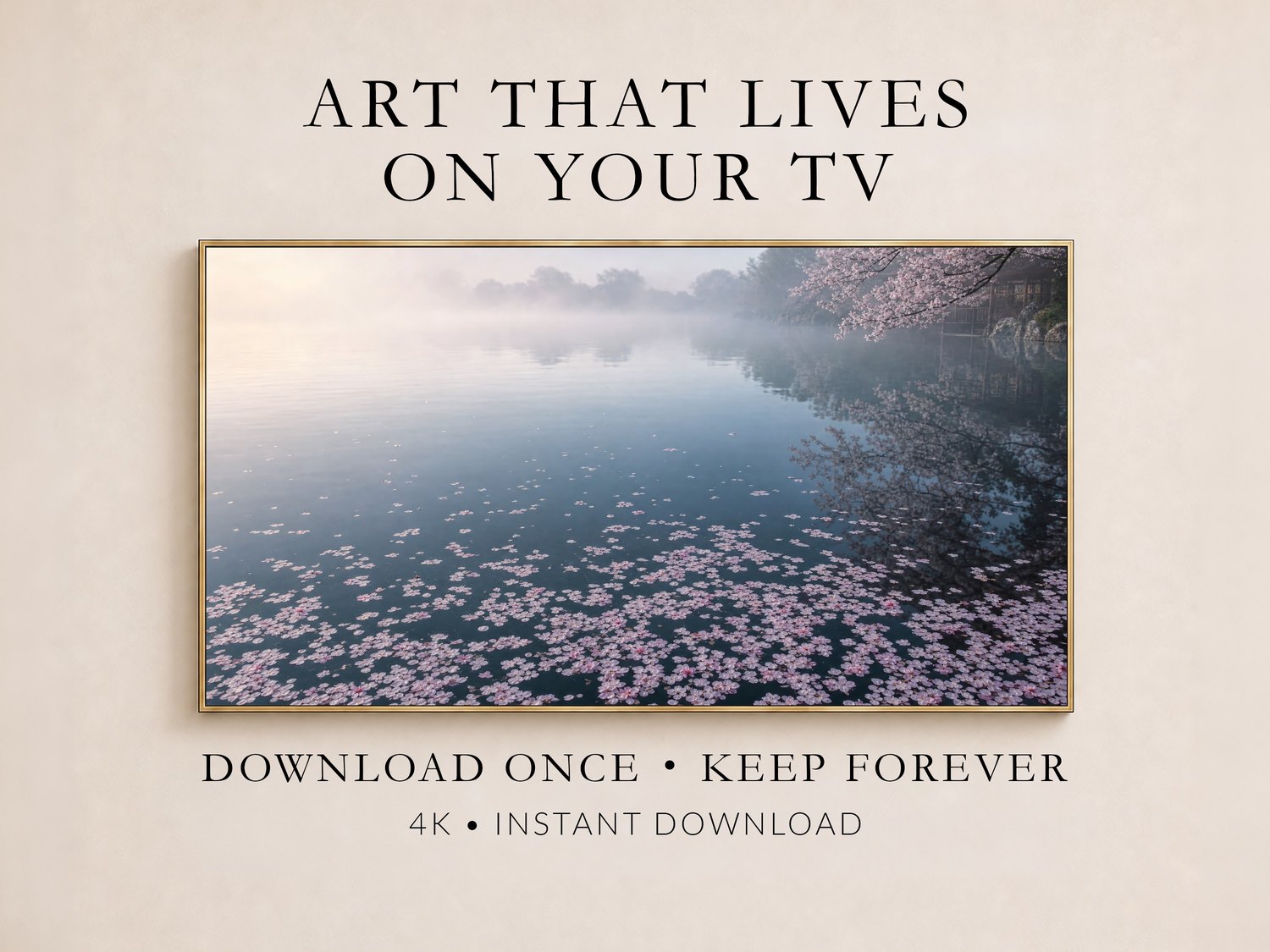 Cherry blossom pond artwork displayed in a thin gold frame on a soft cream wall, showing pink petals scattered across misty blue-grey water, with text noting instant 4K download for Frame TV.