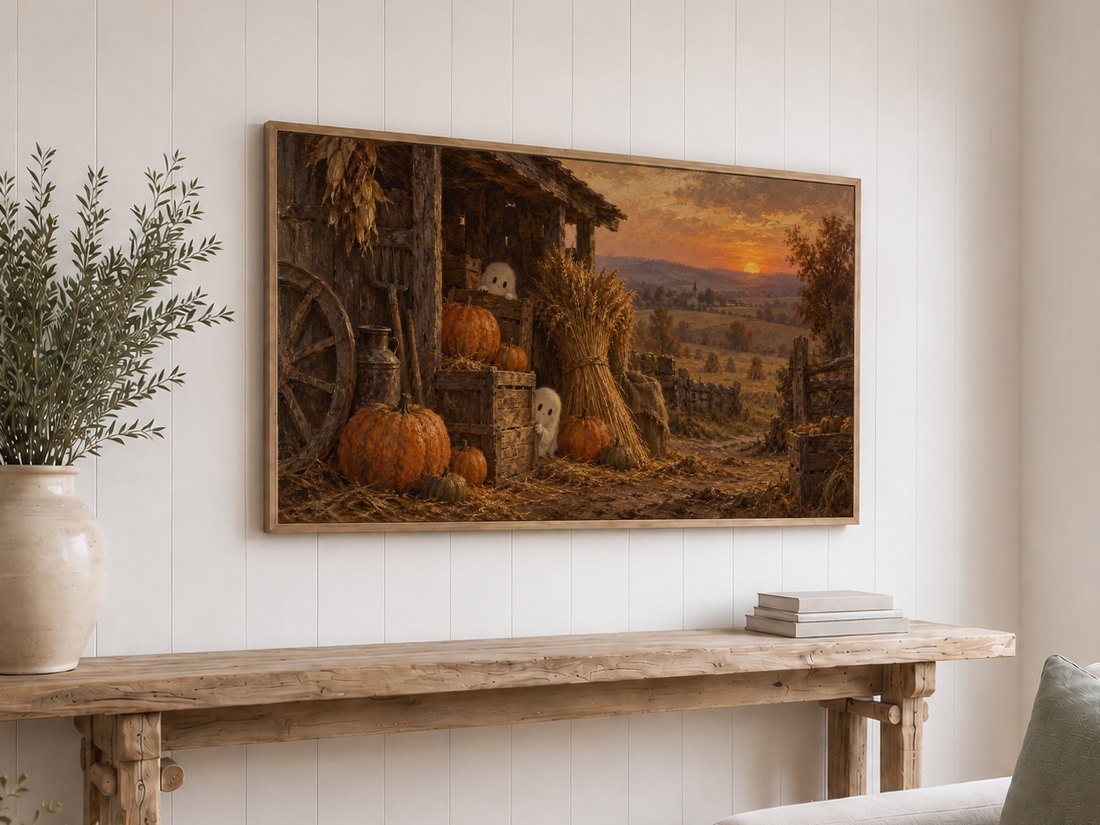 Autumn harvest Frame TV art in light oak frame above rustic reclaimed-wood console table on white shiplap wall, styled with olive branches in cream ceramic vase and stack of neutral books.