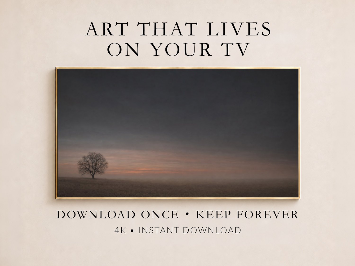 Lone tree frame TV art in a thin gold frame on a cream wall, showing a bare tree in a misty field at dusk with rust and charcoal tones, promoted as a 4K instant download you keep forever.