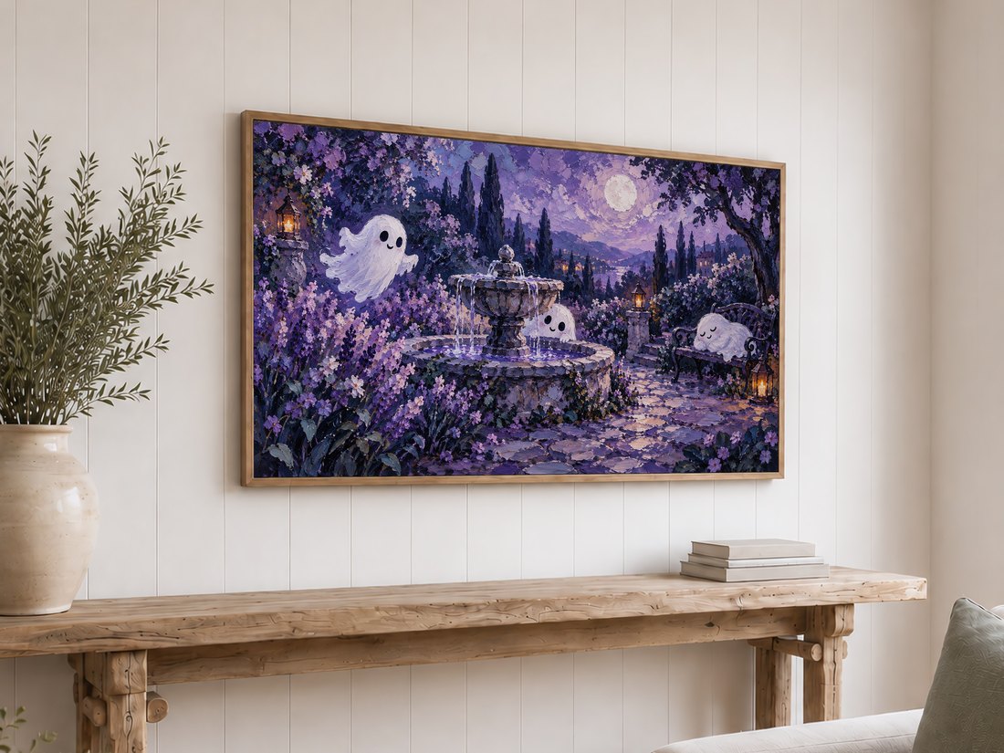 Purple ghost garden frame TV art displayed above a rustic reclaimed-wood console table on a white shiplap wall, with olive branches in a cream ceramic vase and stacked neutral books.
